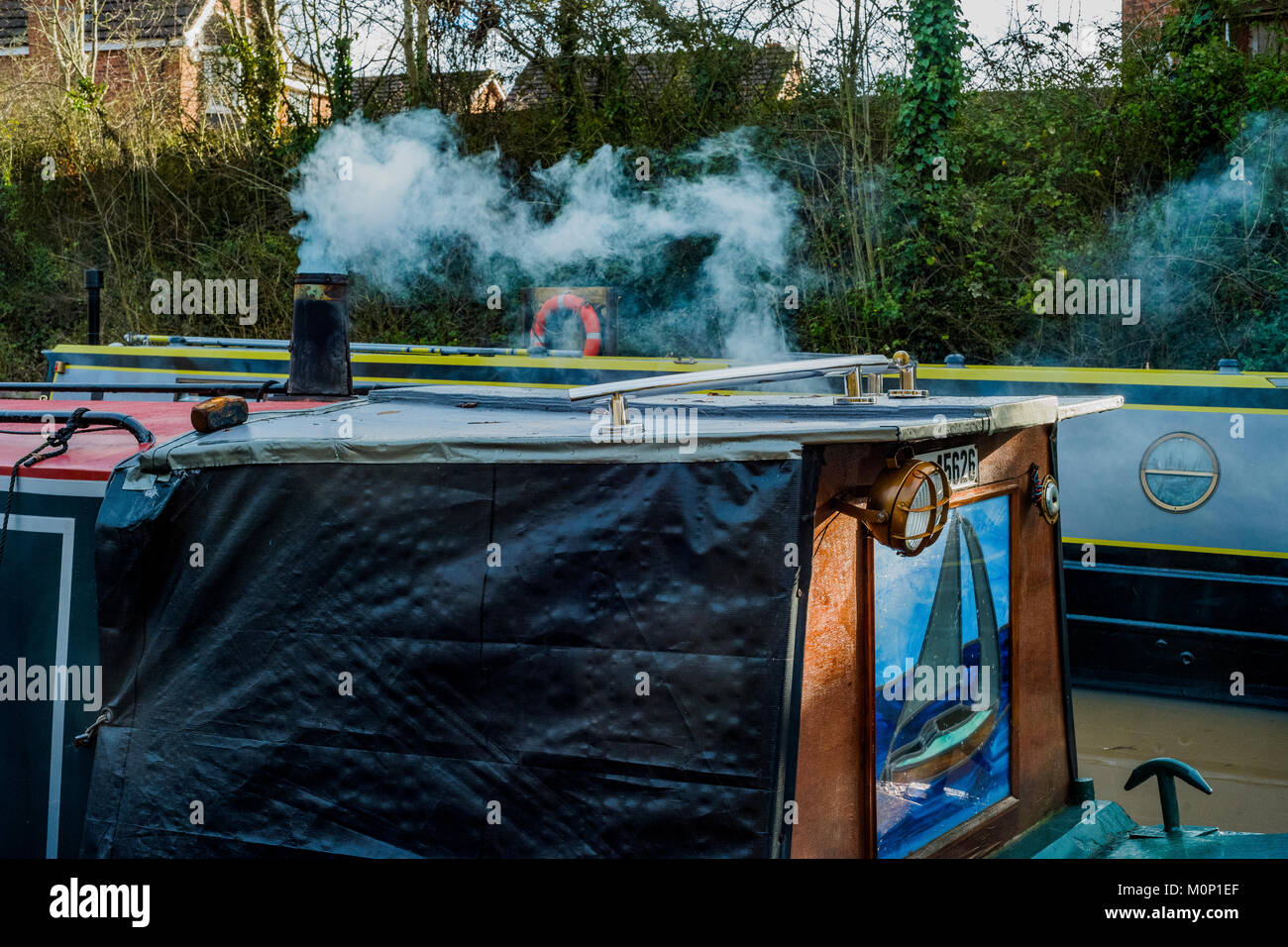 canal river in the english countryside bugbrooke, wharf, marina