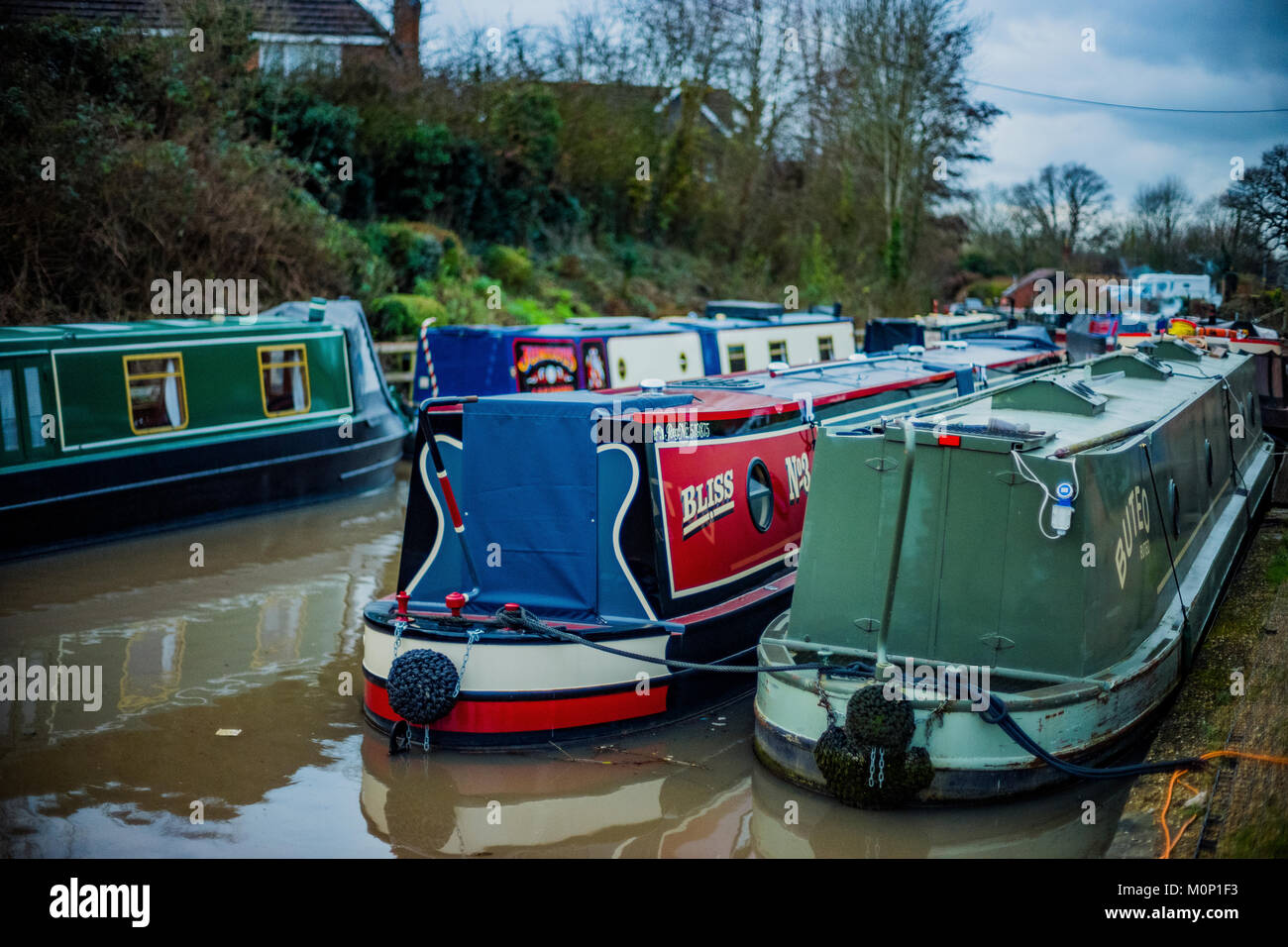 canal river in the english countryside bugbrooke, wharf, marina