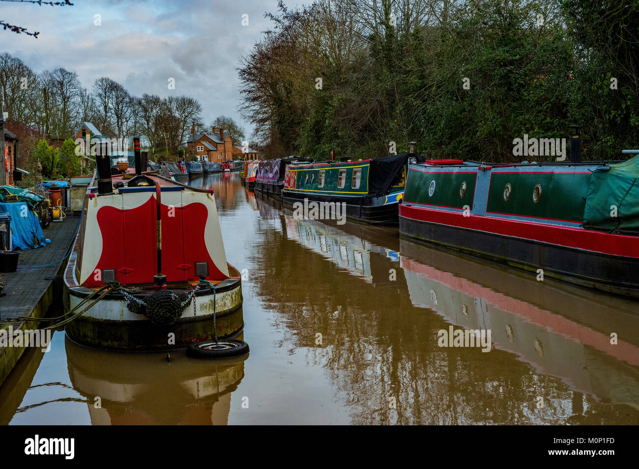 canal river in the english countryside bugbrooke, wharf, marina