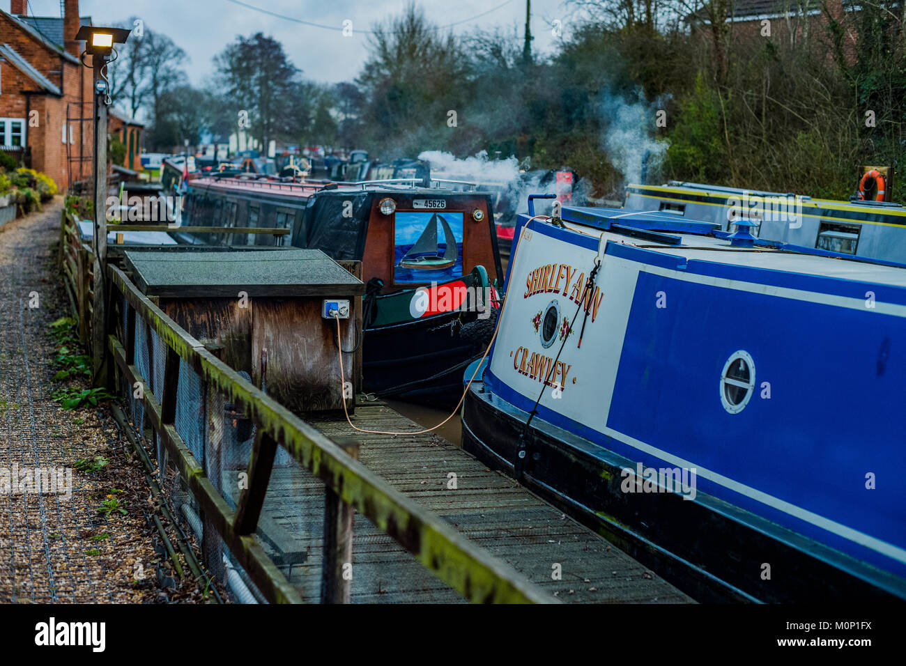 canal river in the english countryside bugbrooke, wharf, marina
