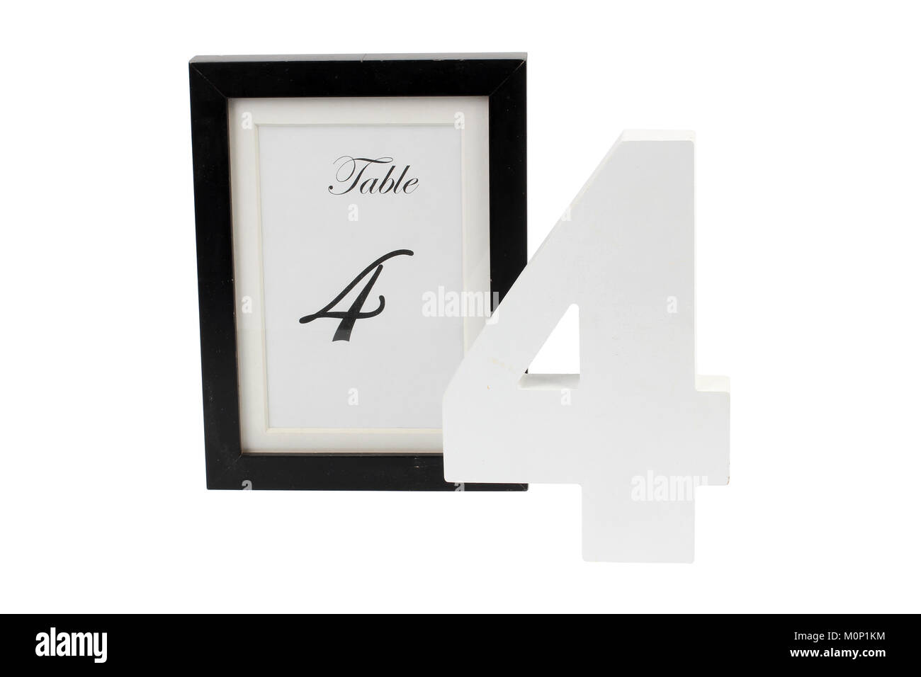 Table Number in Black Frame on Plain Background Stock Photo