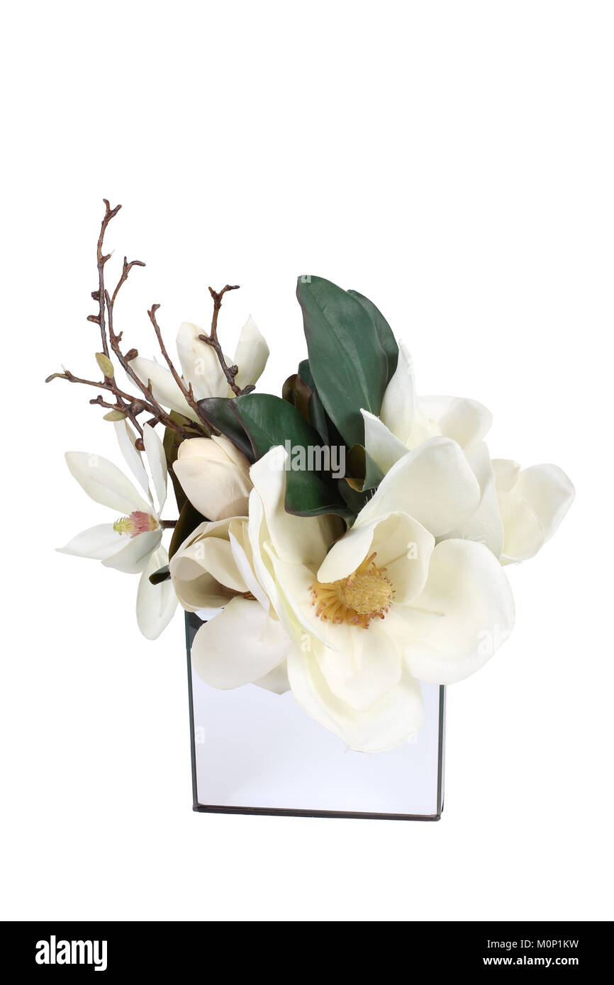 Floral Arrangement on White Square Vase on Plain Background Stock Photo