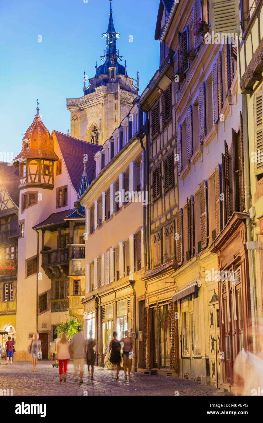 France,Haut Rhin,Alsace Wine Route,Colmar,street des Marchands with a view of the house Pfister of Renaissance style (1537) and the bell tower of the collegiate church Saint-Martin Stock Photo