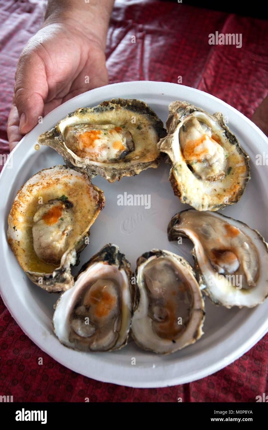 United States,Louisiana,New Orleans,oysters cooked on the BBQ are a true delicacy Stock Photo