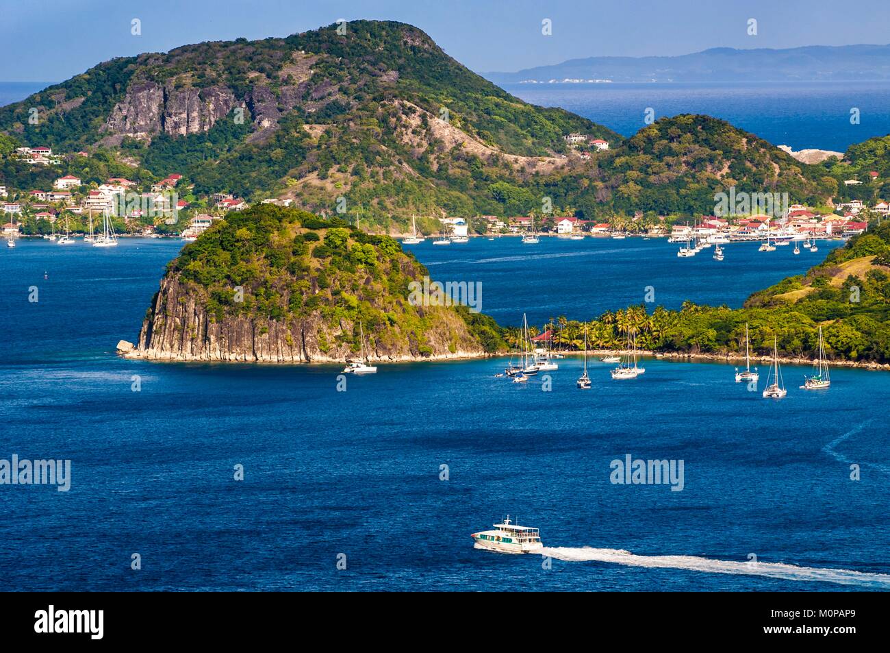 France,Caribbean,Lesser Antilles,Guadeloupe,Les Saintes,Terre-de-Haut,view  of Terre-de-Haut and the Pain de Sucre from Terre-de-Bas,Marie Galante in  the background Stock Photo - Alamy