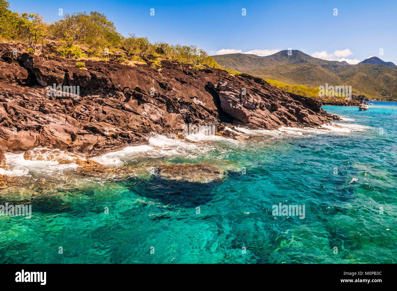 France,Caribbean,Lesser Antilles,Guadeloupe,Basse-Terre,Bouillante,Coastline Pigeon Islands,in the heart of the nature reserve Cousteau Malendure,mecca of diving in the archipelago,Basse-Terre in the background Stock Photo