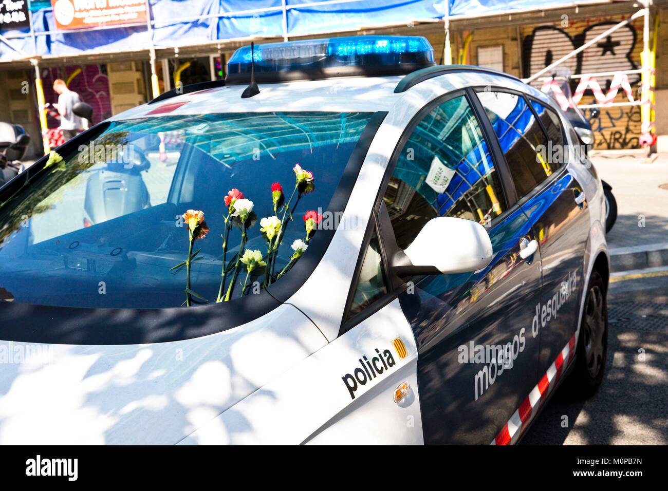 Spain,Catalonia,Barcelona,Pre referendum Oct 1st 2017,mossos d'esquadra (Catalan Police)'s car with flowers Stock Photo