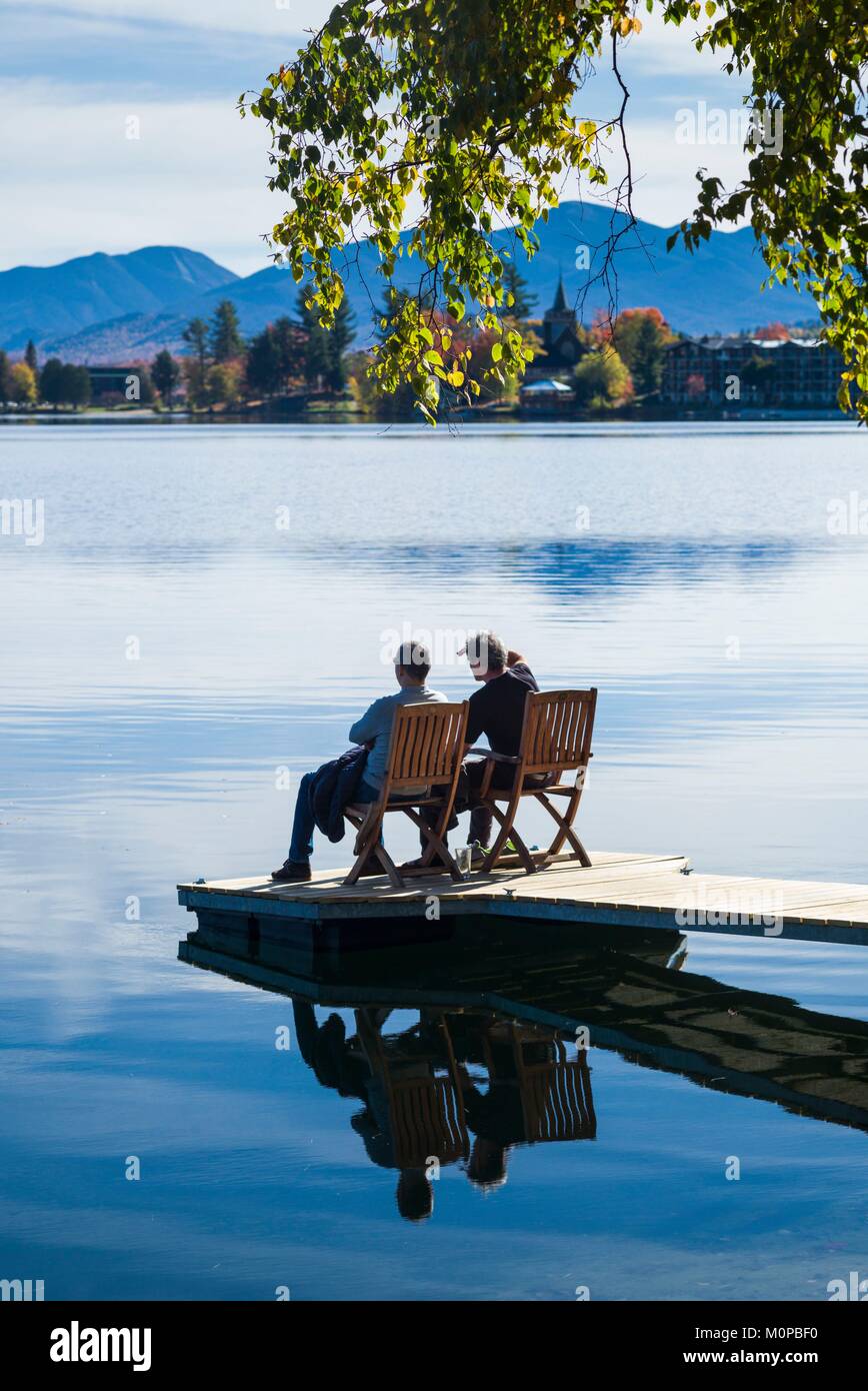 United States,New York,Adirondack Mountains,Lake Placid,Mirror Lake with people Stock Photo