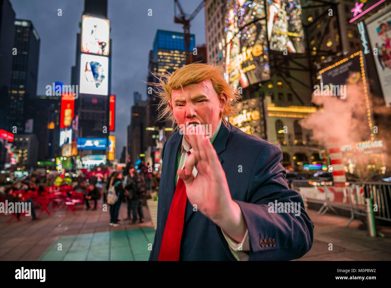 United States,New York,New York City,Mid-Town Manhattan,Times Square,man in Donald Trump mask Stock Photo