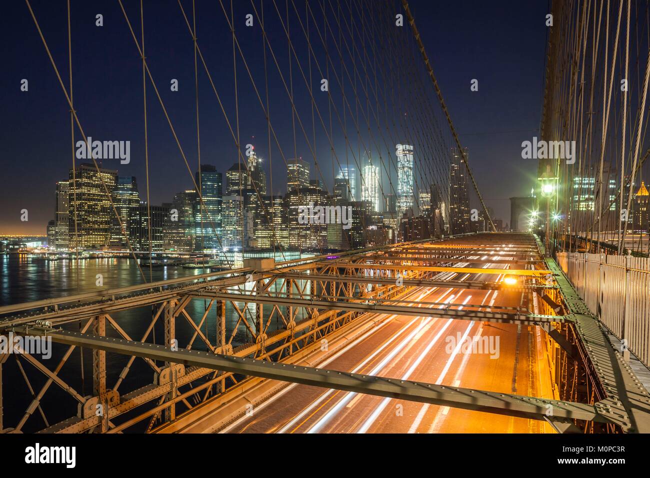 United States,New York,New York City,Brooklyn-Dumbo,Brooklyn Bridge traffic,dawn Stock Photo