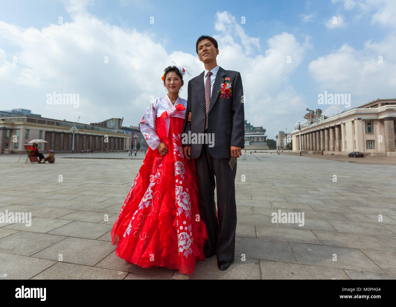 North Korean couple newly wed in Kim il Sung square, Pyongan Province, Pyongyang, North Korea Stock Photo