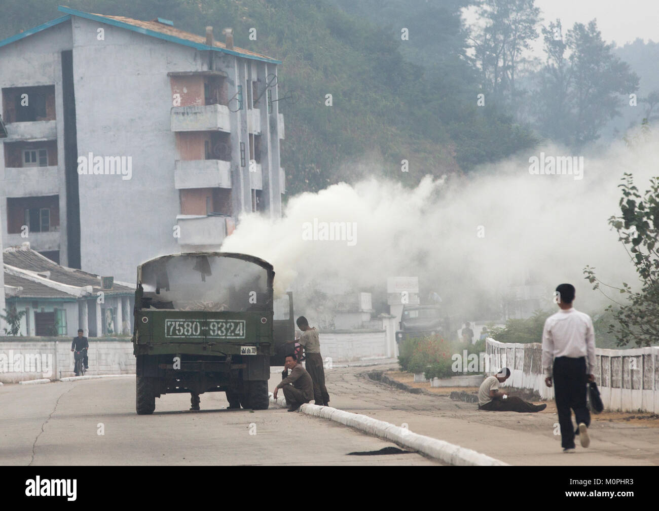 Wood-burning steam truck out of order on a road, South Hamgyong Province, Hamhung, North Korea Stock Photo