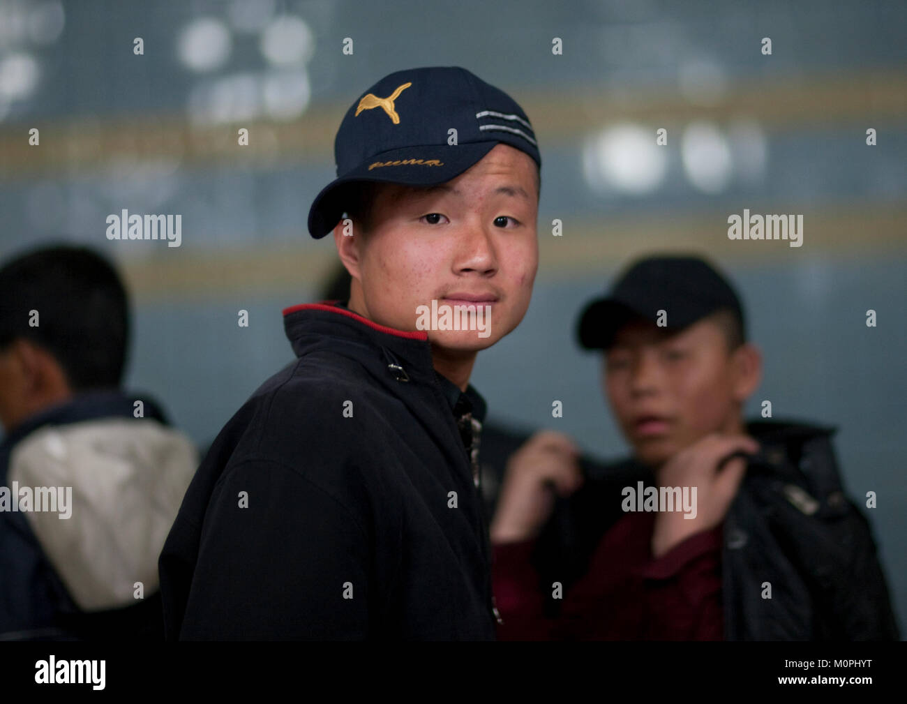 North Korean teenage boy with a puma 