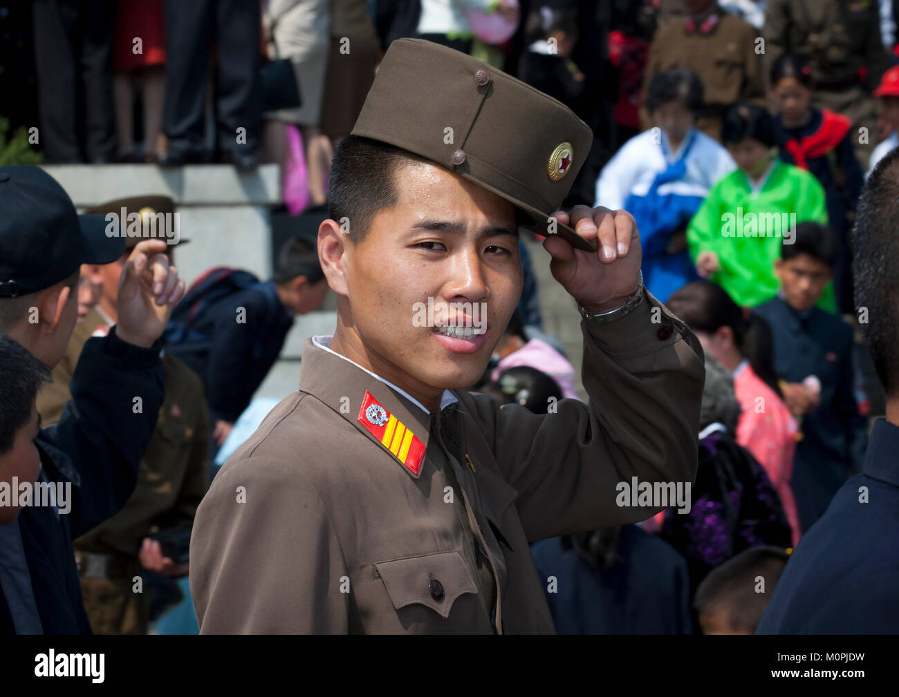 North Korean soldier with a relaxed attitude in the street, Pyongan Province, Pyongyang, North Korea Stock Photo