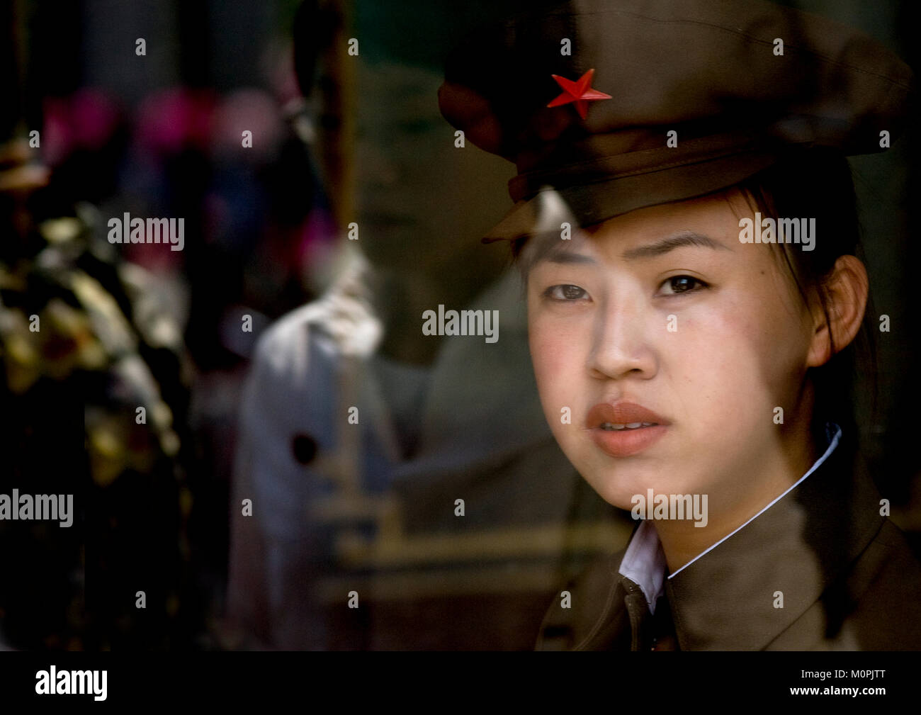 North Korean woman guard in central history museum, Pyongan Province