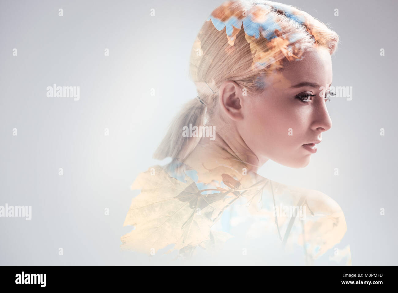 Nice appealing woman looking back Stock Photo - Alamy