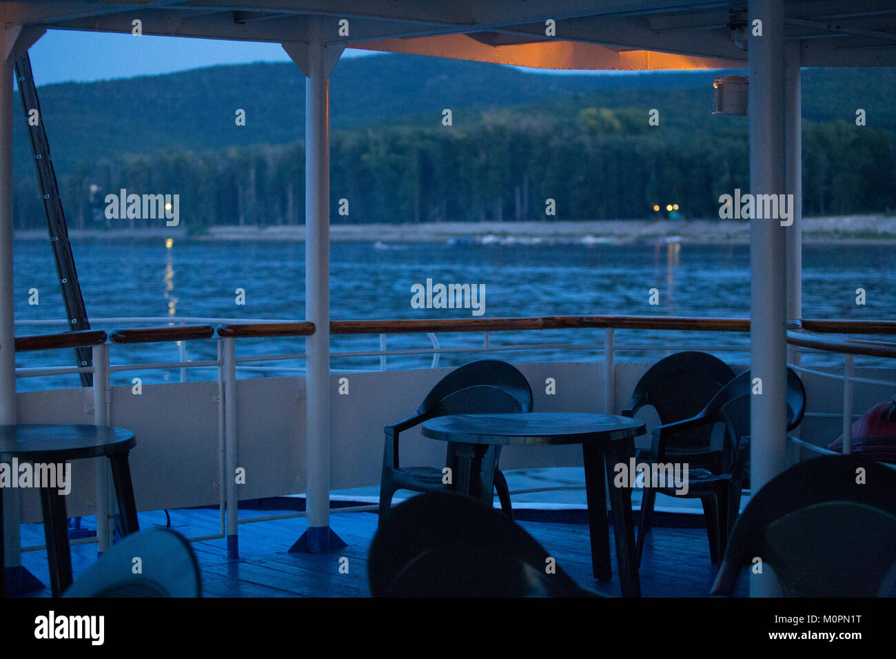 Cruise ship deck at evening Stock Photo - Alamy