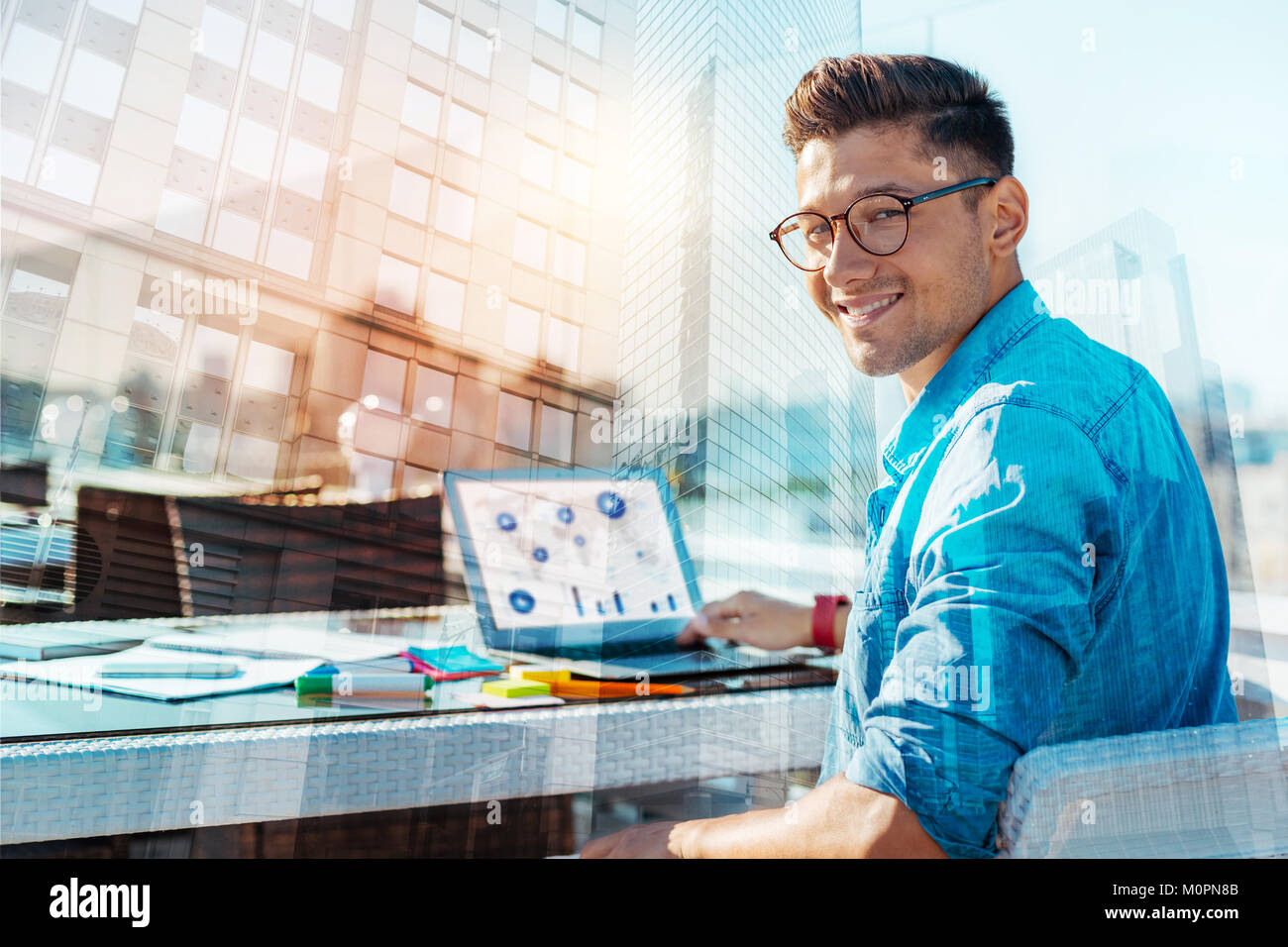 Inspired man enjoying his work Stock Photo - Alamy