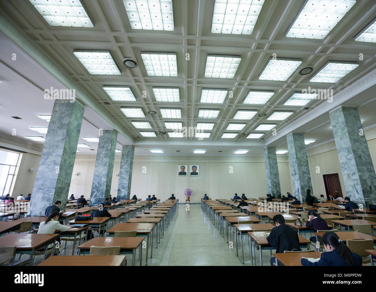 Multimedia room of the Grand people's study house with the offcial portraits of the Dear Leaders