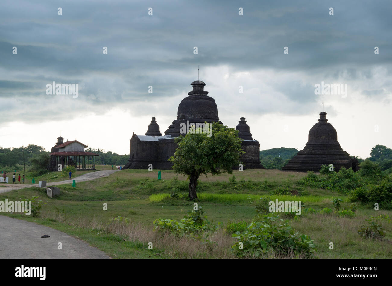 Dark clouds over the ancient temples of Mrauk U, Rakhine State, Myanmar Stock Photo