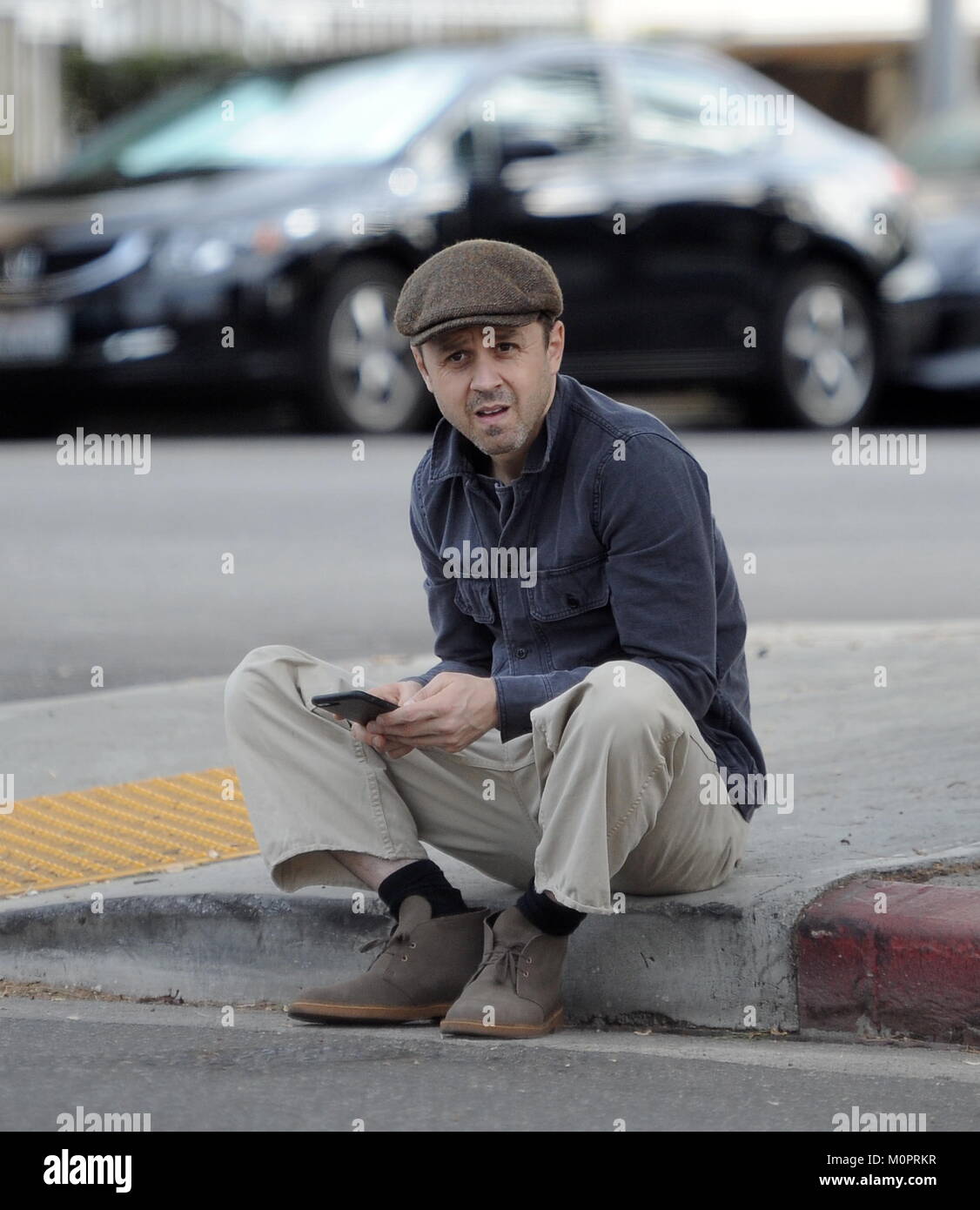 EXCLUSIVE Actor Giovanni Ribisi sitting on the curb while waiting for his girlfriend to pick him up. Afterwards, the couple went for a brunch at Homestate Cafe in Los Angeles.  Featuring: Giovanni Ribisi Where: Los Angeles, California, United States When: 23 Dec 2017 Credit: WENN Stock Photo