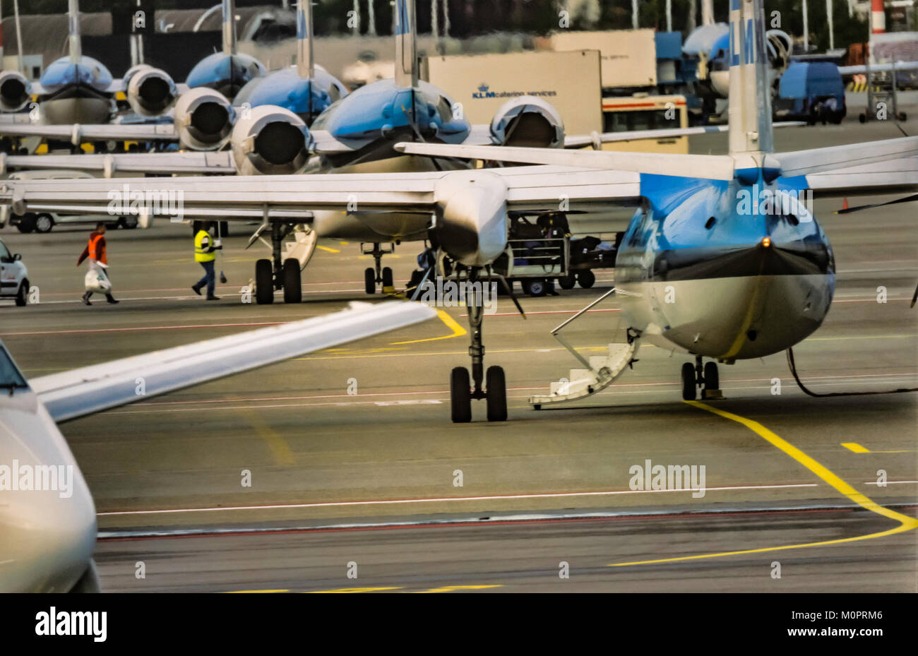 Jet airplanes on airport tarmac prepare for takeoff Stock Photo - Alamy