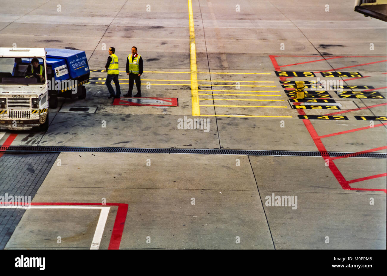 Jet airplanes on airport tarmac prepare for takeoff Stock Photo - Alamy