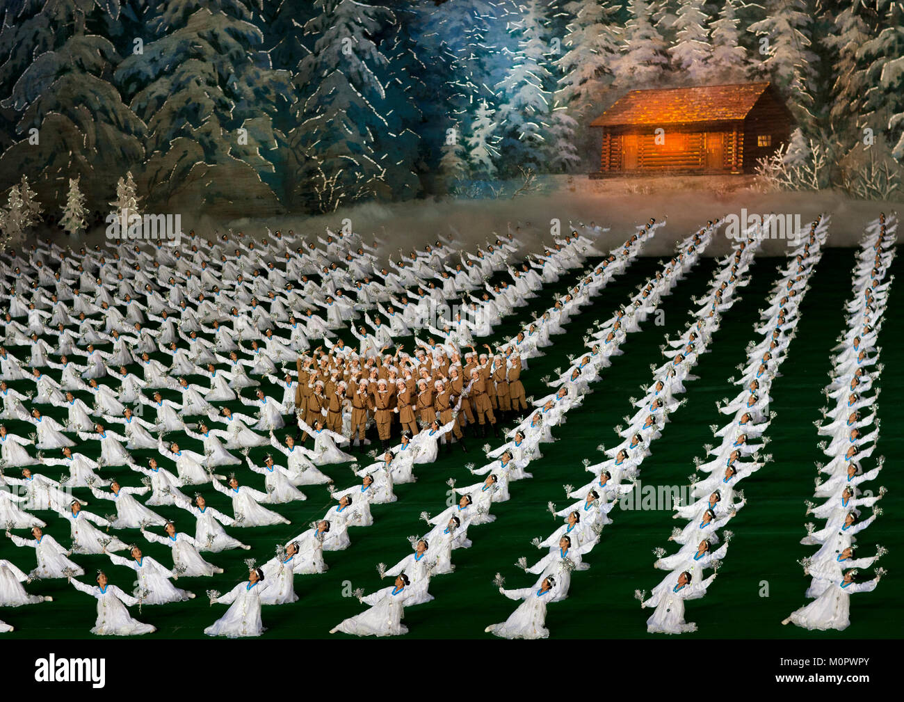 North Korean dancers performing in front of Kim Jong il native house during Arirang mass games in may day stadium, Pyongan Province, Pyongyang, North Korea Stock Photo