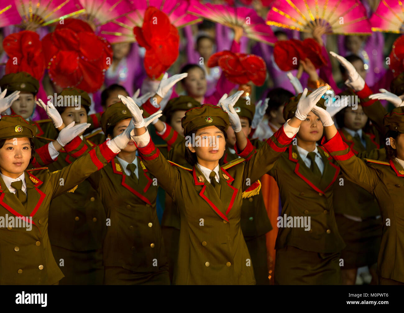 North Korean women dressed as soldiers at Arirang mass games in may day stadium, Pyongan Province, Pyongyang, North Korea Stock Photo