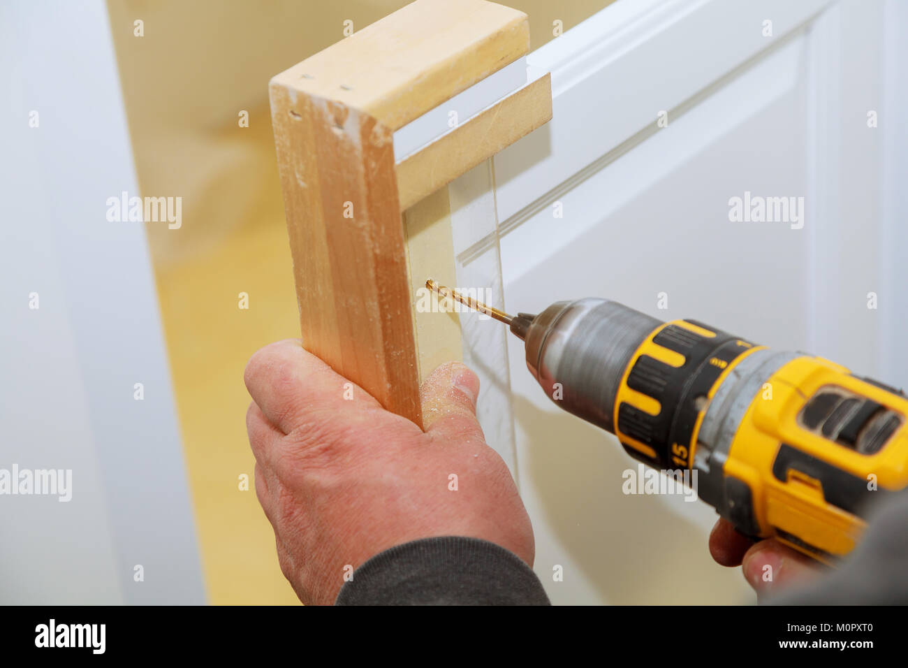 Installation Of Furniture Hinges On The Cabinet Door Master Drills