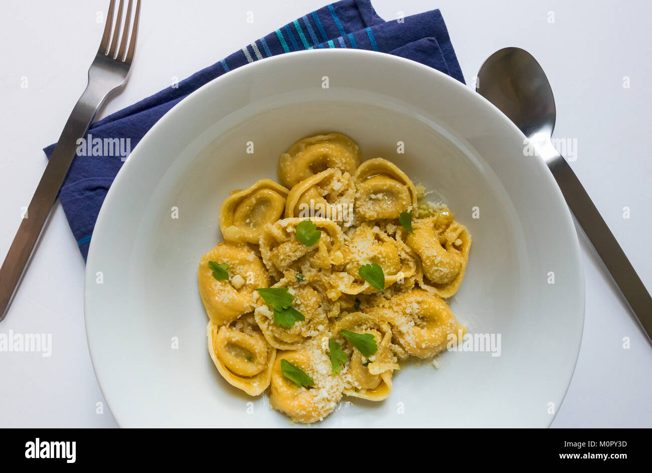 Cheese Tortellini in a garlic butter sauce Stock Photo Alamy