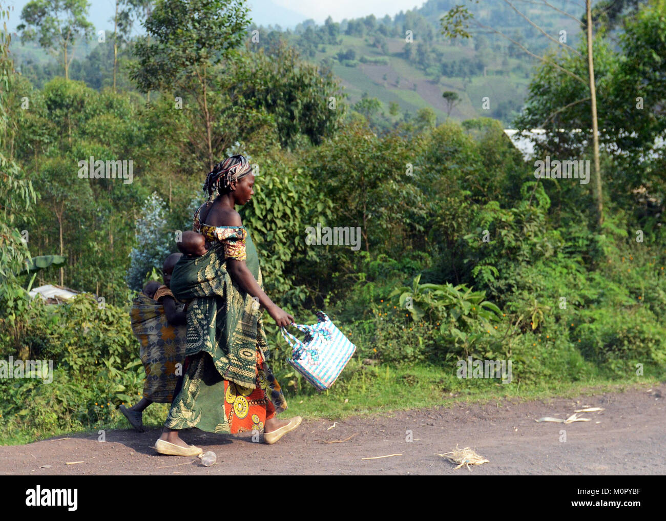 A Congolese woman carrying her baby. Stock Photo