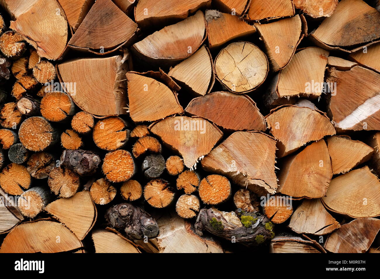 Tightly stacked woodpiles are a frequent sight in parts or Germany. Stock Photo