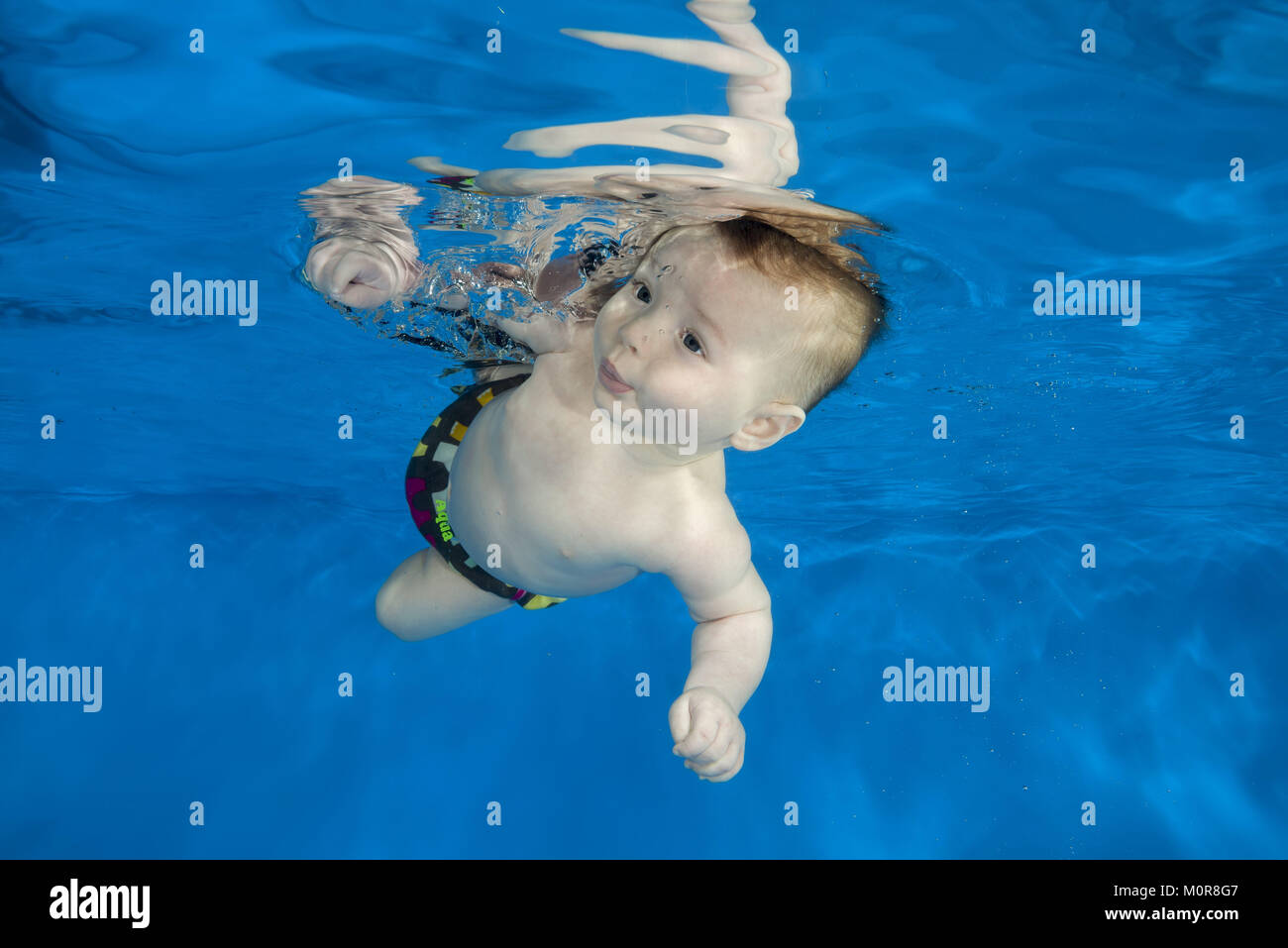Odessa, Ukraine. 20th Jan, 2018. little 4 months boy learns to swim