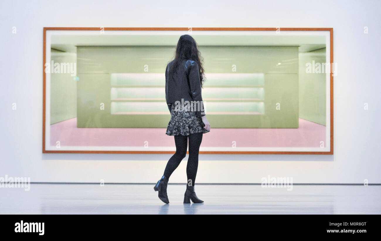London, UK. 24 January 2018. A visitor views "Prada II", 1997, by Andreas  Gursky. Preview of "Andreas Gursky", the first major UK retrospective by  the acclaimed German photographer at the newly refurbished
