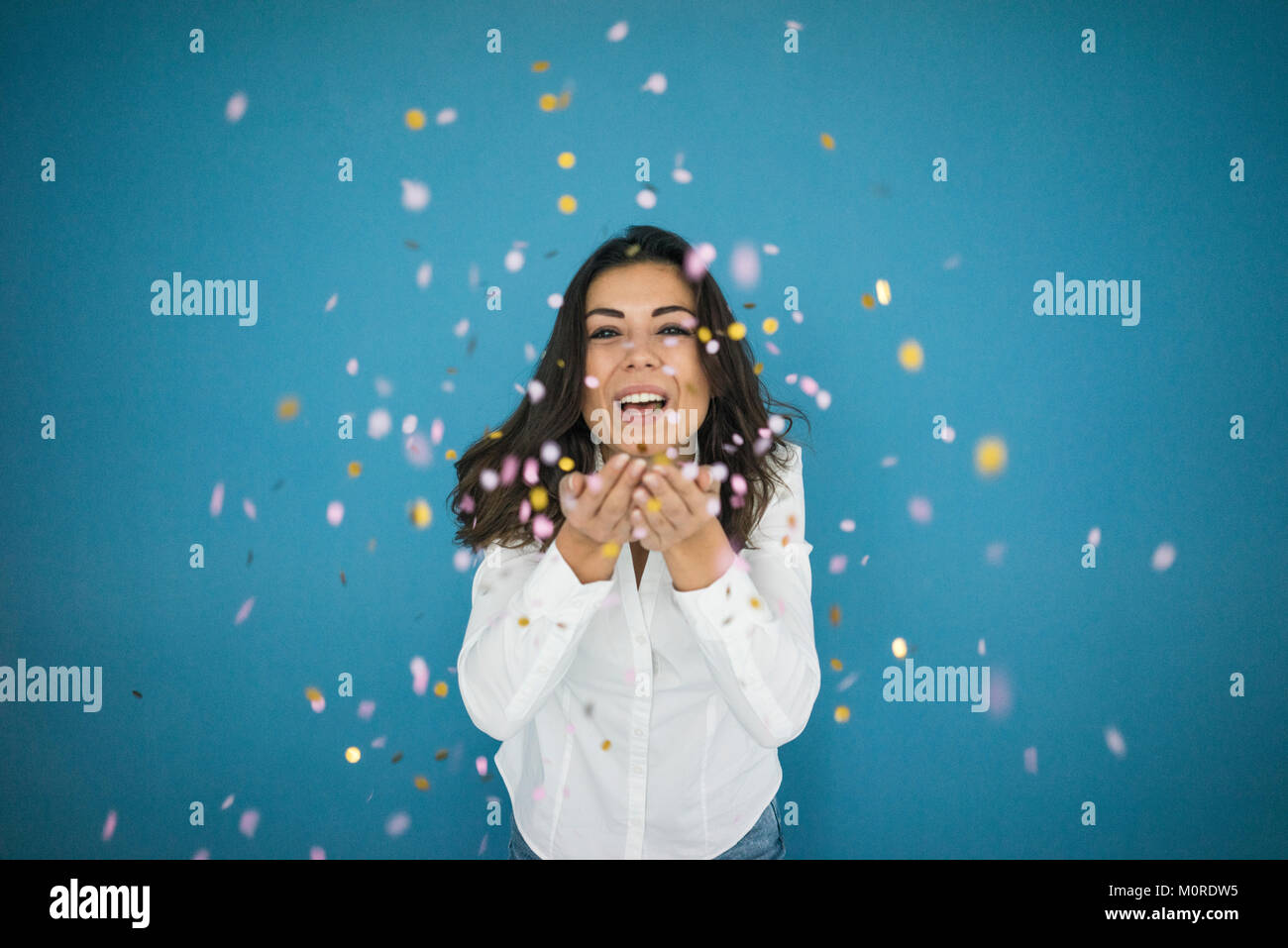 Hand throwing confetti hires stock photography and images Alamy