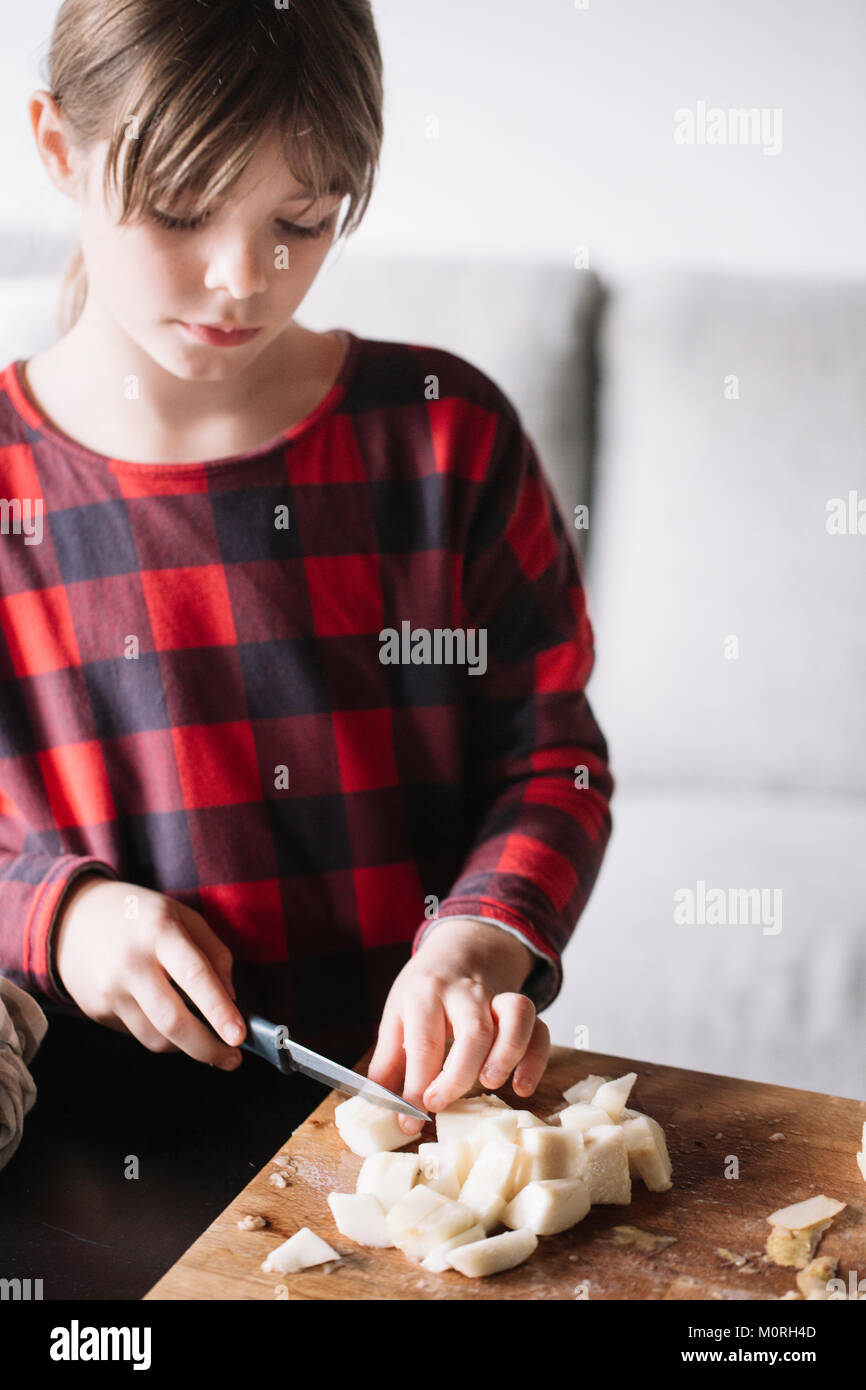Portrait of chopping pear Stock Photo - Alamy