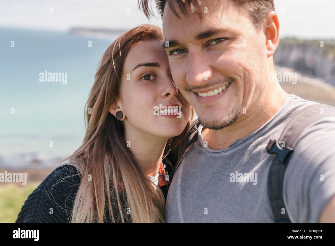 Portrait of young couple Stock Photo - Alamy