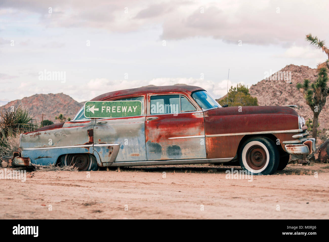 USA, California, Joshua Tree, oldtimer with Freeway-sign Stock Photo ...