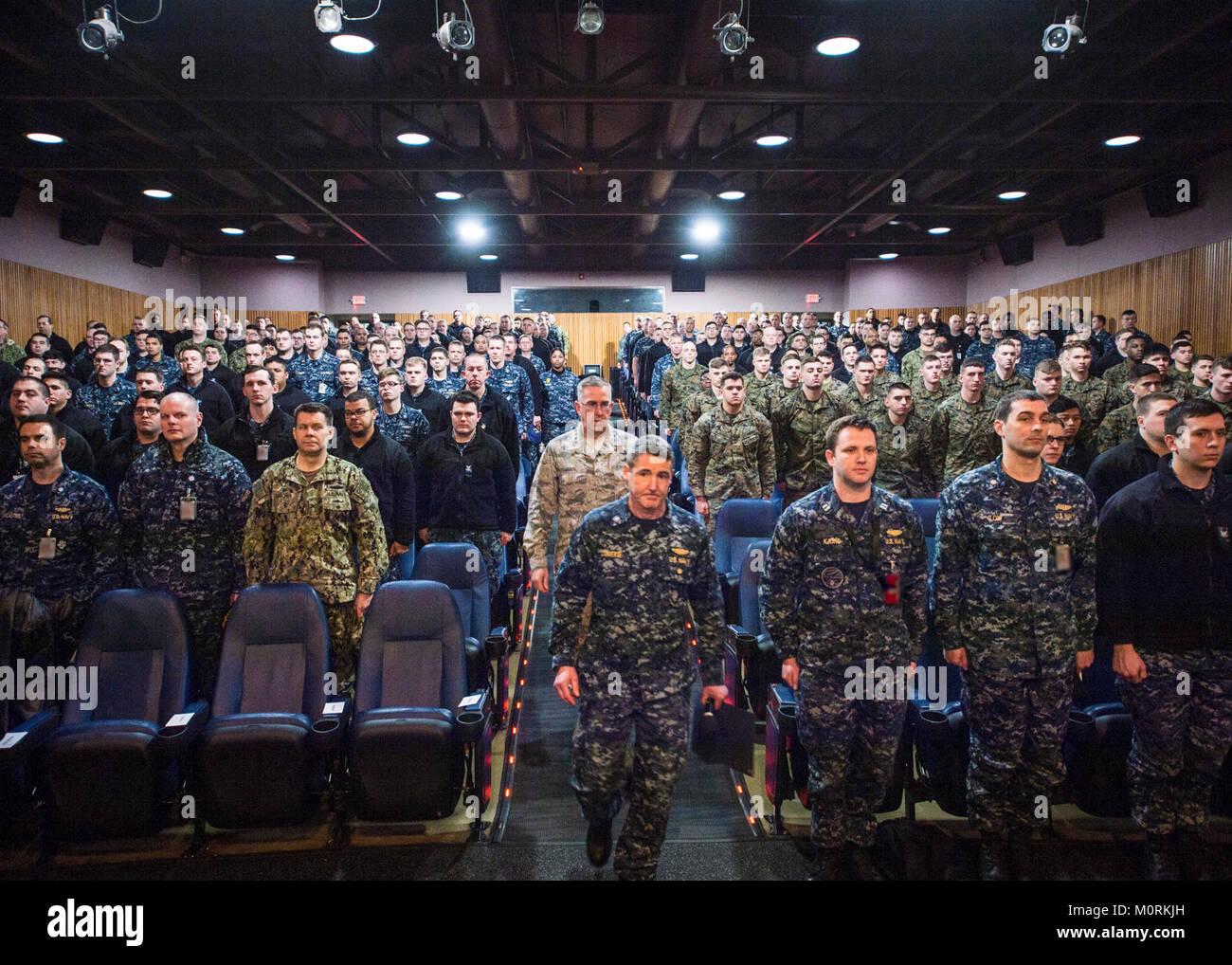 BANGOR, Wash. (Jan. 18, 2018) - U.S. Air Force Gen. John Hyten, commander of U.S. Strategic Command, enters the base theater with  Commander, Submarine Group 9, Rear Adm. Blake Converse before addressing over 350 Sailors, Marines, and civilians at Naval Base Kitsap-Bangor, Wash., Jan 18, 2018. Hyten visited staff and facilities assigned to Commander Submarine Group 9 at Naval Base Kitsap-Bangor to see the operations of one leg of the nuclear triad. (U.S. Navy Stock Photo