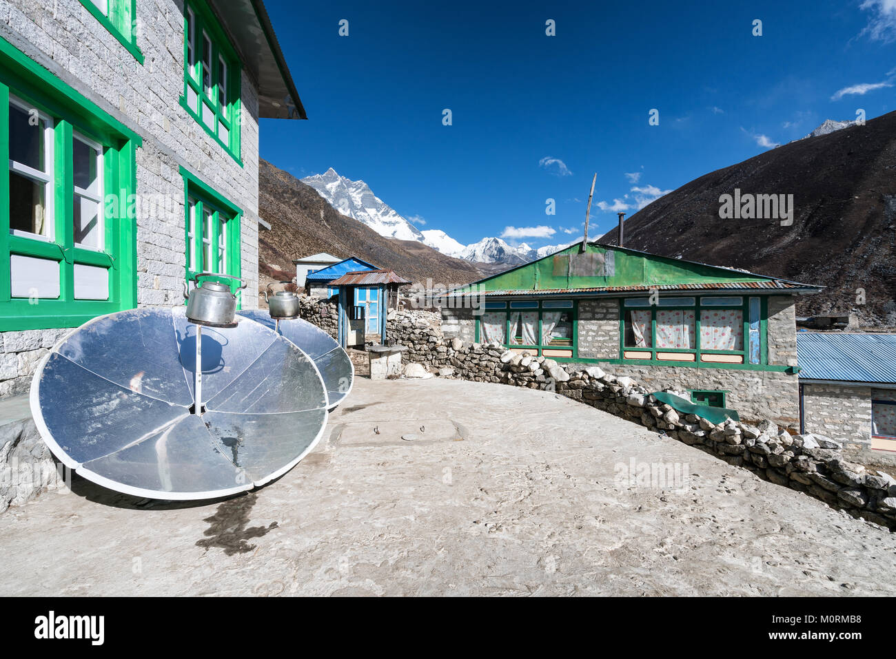 Water heating by solar power in Dingboche, Nepal Stock Photo