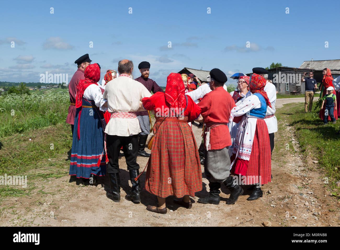 Shelota, Verkhovazhsky district, Vologda region, Russia - June 23, 2013: A walk in the countryside with dancing. Patronal Feast of the Blessed Trinity Stock Photo