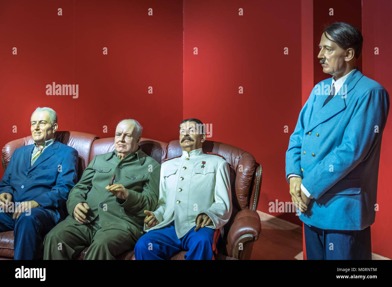 Wax statues of four powers Roosevelt, Churchill, Stalin and Hitler at the Krakow Wax Museum - Cracow, Poland. Stock Photo