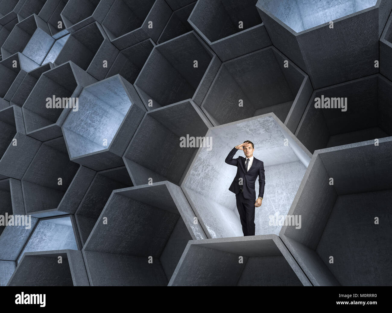 standing businessman in 3d abstract hexagon structure Stock Photo - Alamy