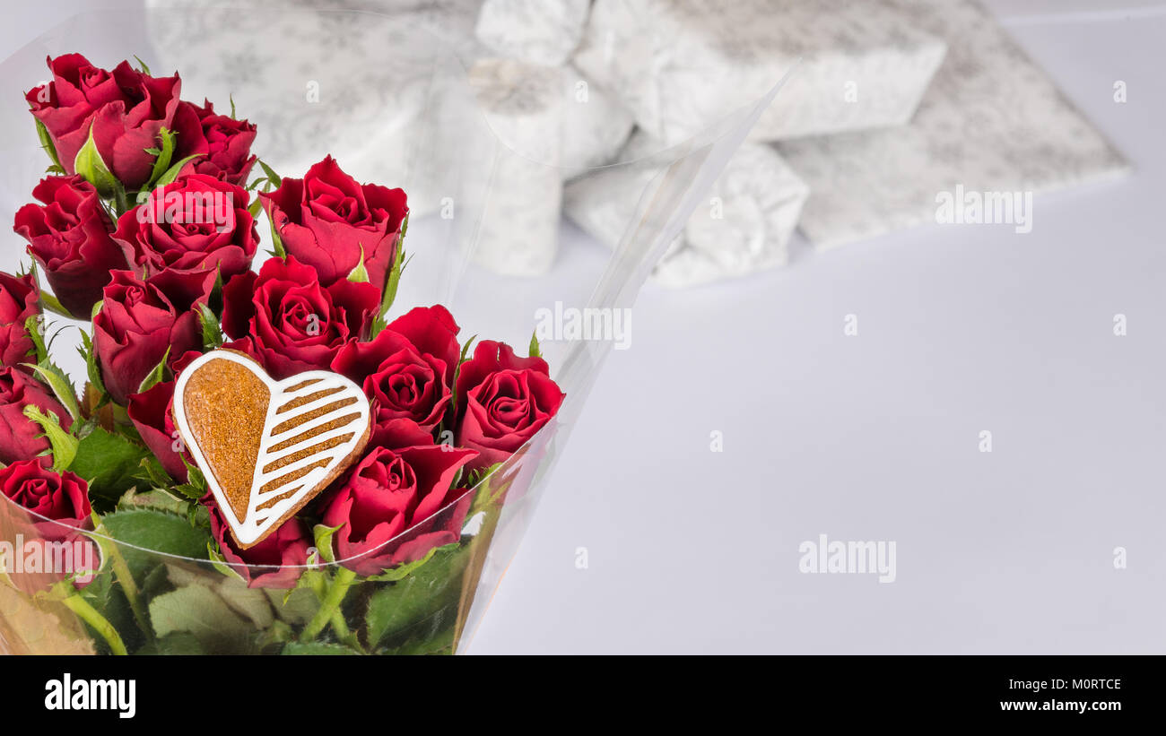 Bouquet of red roses and sweet heart for good luck.Decorative flowers