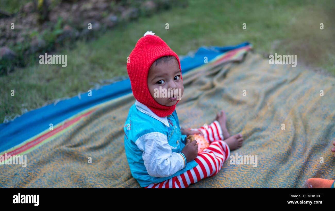 a portrait of a young Indian child at a women's refuge in Udaipur Stock Photo