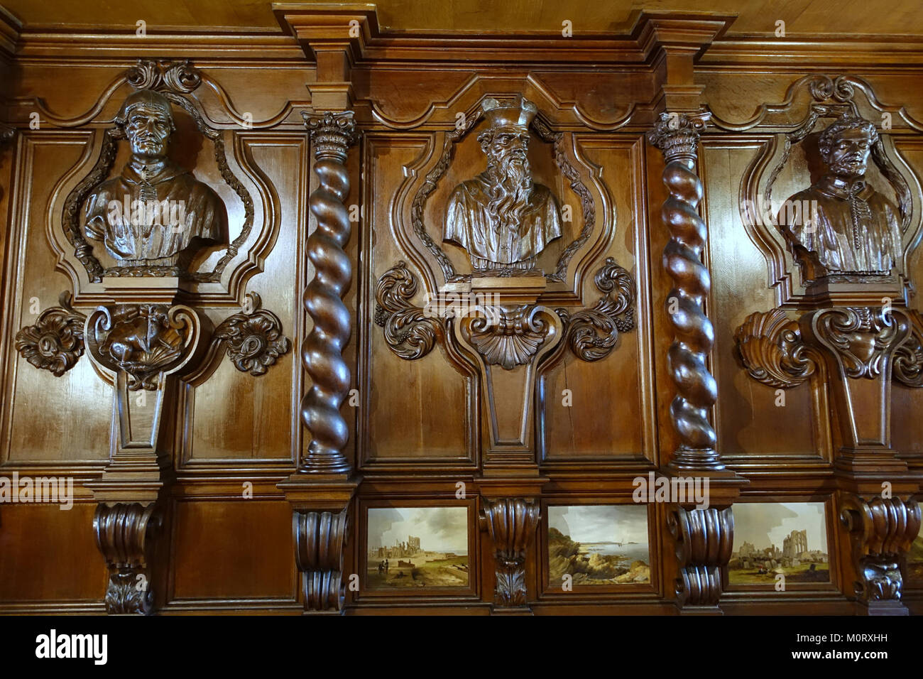 Carved busts and panelling from a German monastery, acquired 1837, with paintings by John Wilsom Carmichael - Oak Room, Chatsworth House - Derbyshire, England - DSC03035 Stock Photo