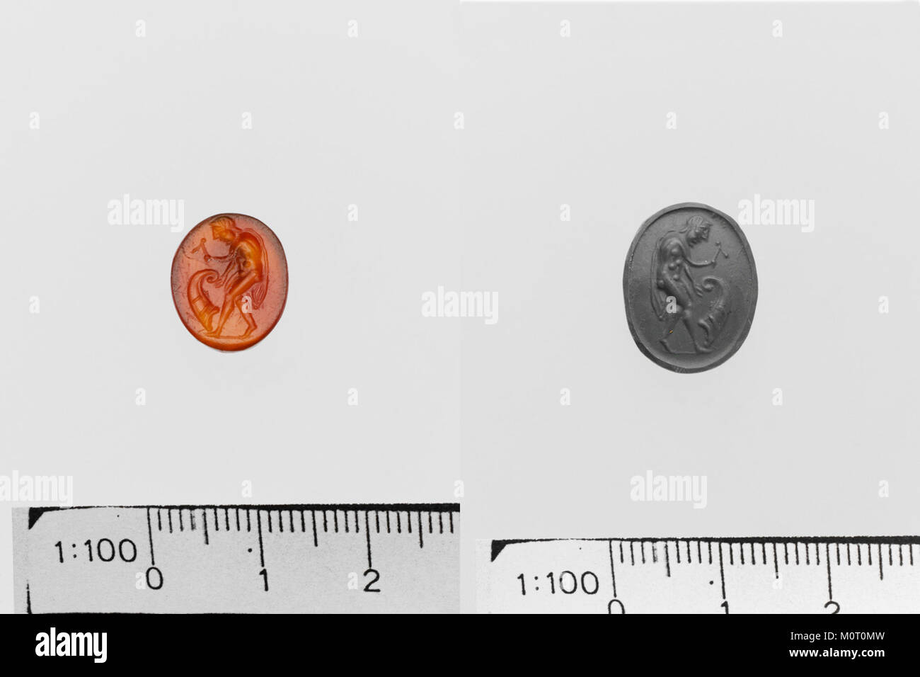 The carnelian ring stone, housed at the Metropolitan Museum of Art, is an ancient gemstone carved with intricate details, reflecting the skill of its creators and the significance of the material. Stock Photo