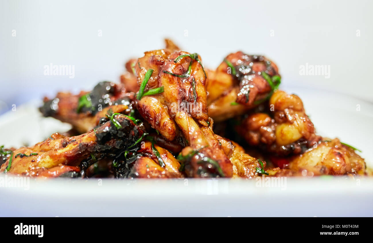 Chicken wing drumsticks caramelized, thai recipe Stock Photo Alamy