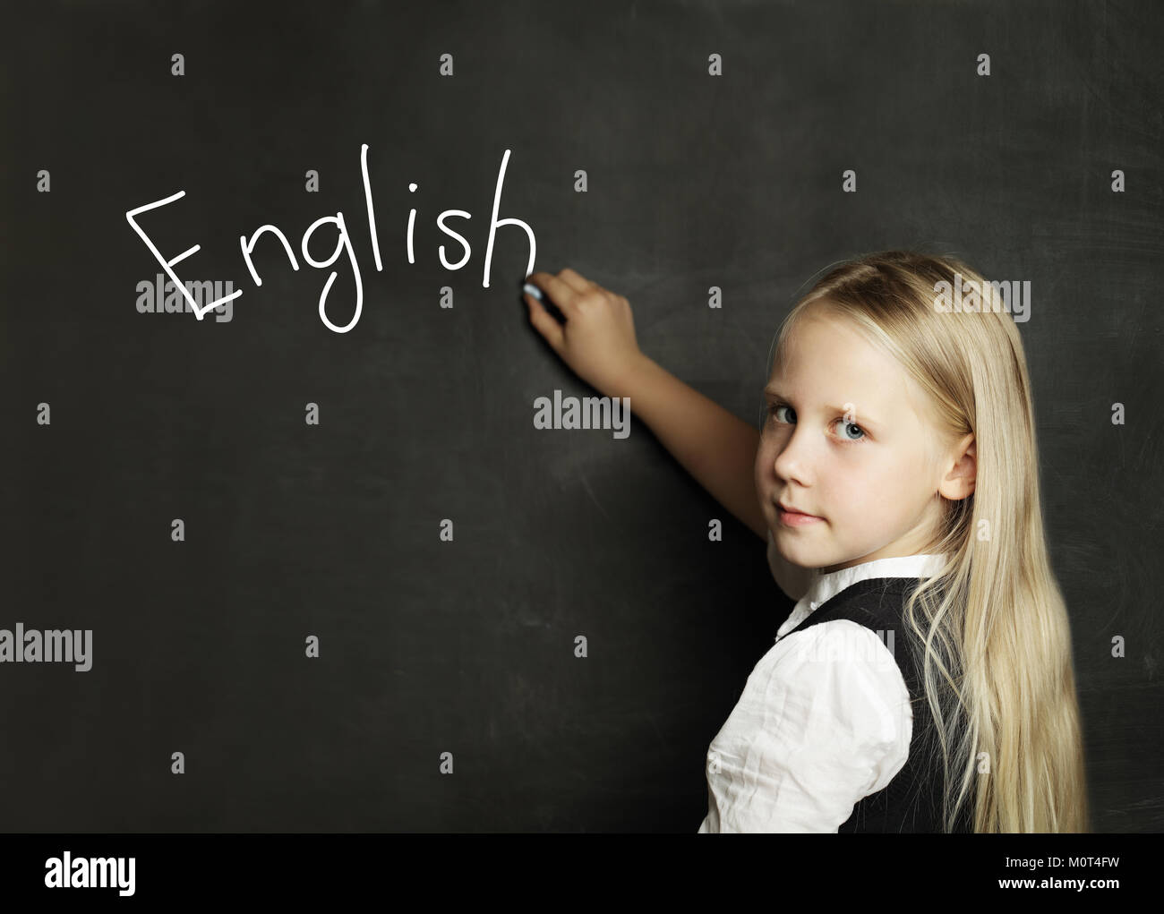 Child Girl Learning English on the School Classroom Blackboard Background  Stock Photo - Alamy